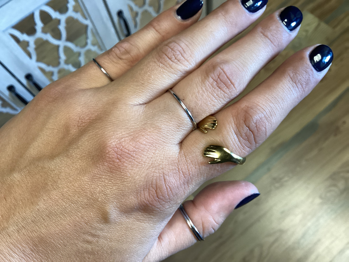 Hands Reaching Ring