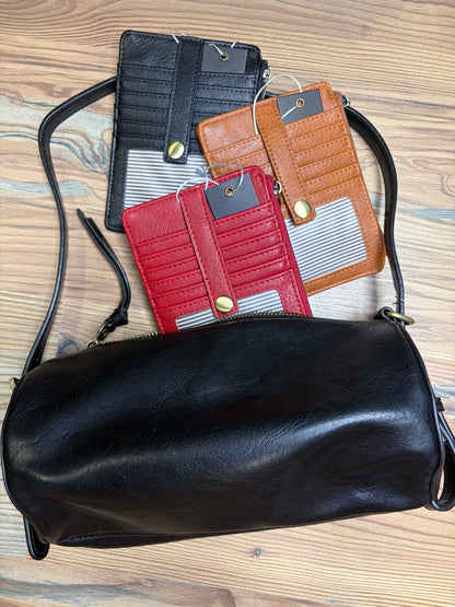 Black Barrel Shoulder Bag
