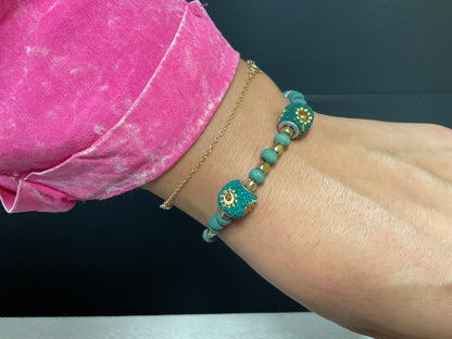 Teal And Gold Bracelets